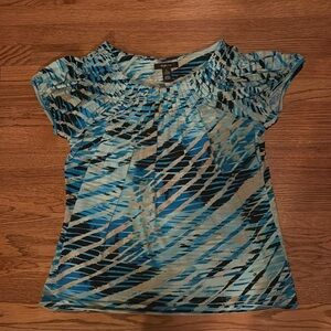 Blue black and tan top with pleated neckline